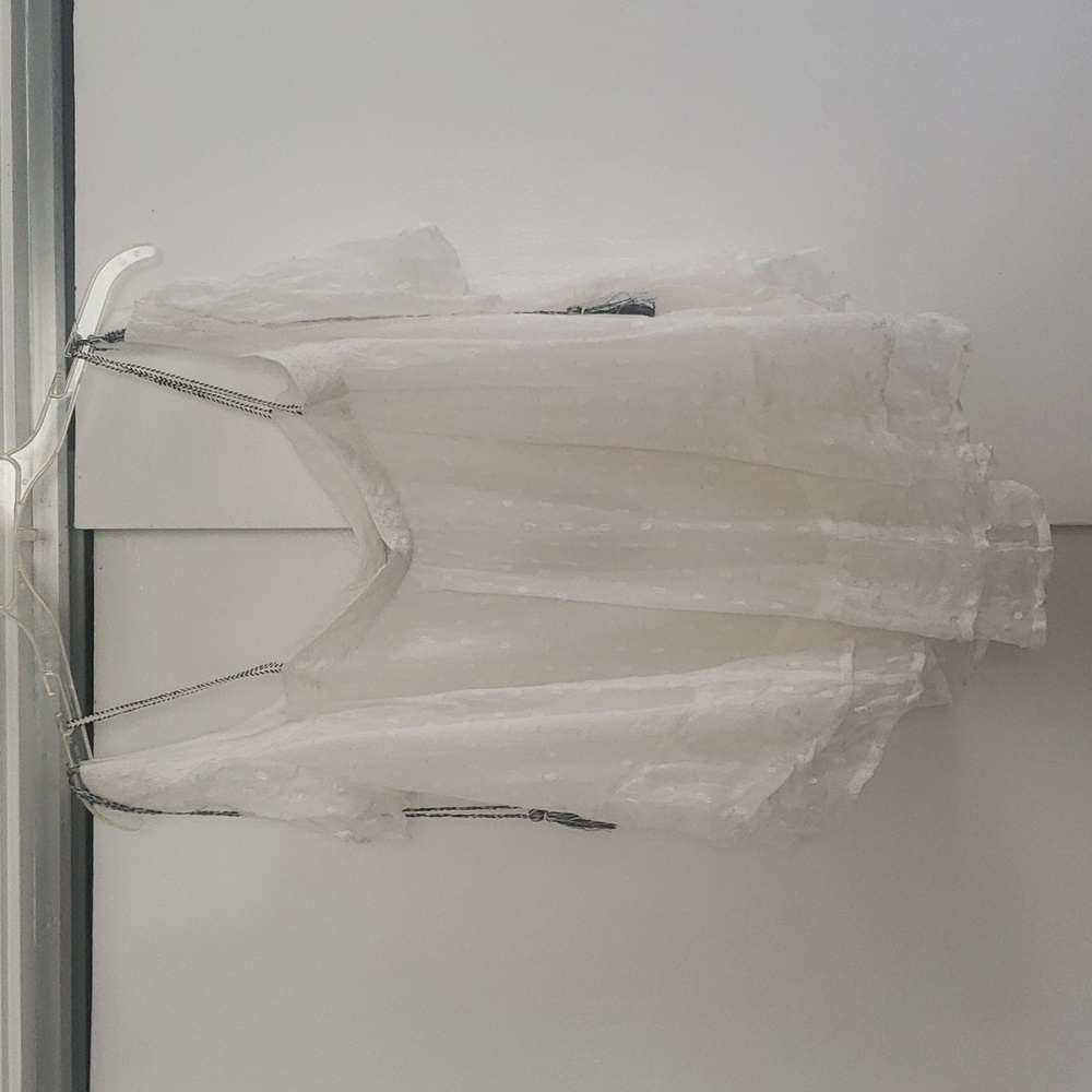Gauzy, chiffon, off the shoulders blouse.